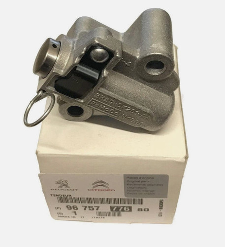 Timing chain tensioner for - chain,